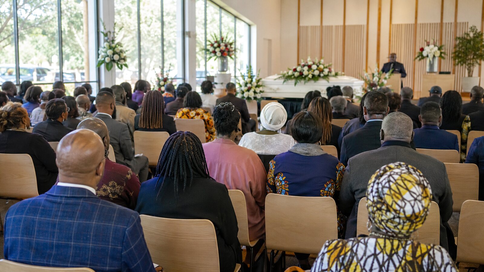 African Australian funerals: a community gathering in colourful traditional dress