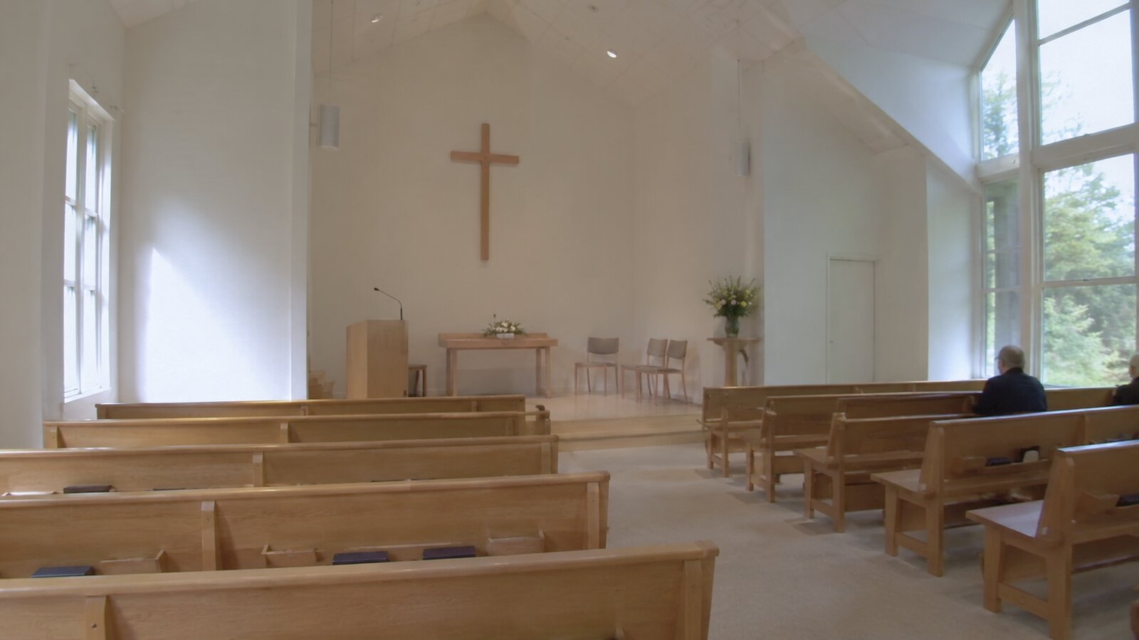 Anglican, Uniting and Protestant funerals in Australia: a light-filled church interior with a plain cross