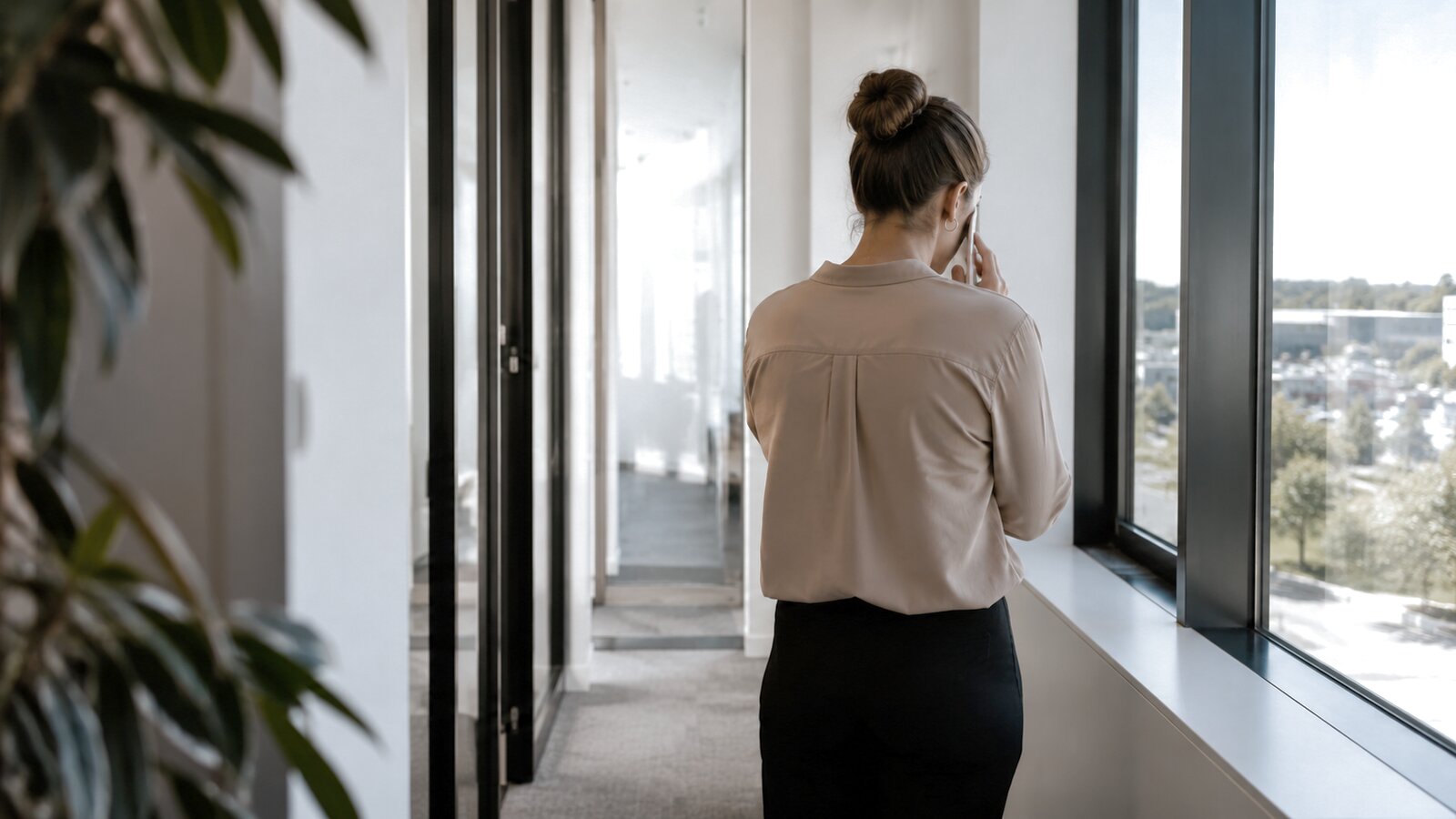 Bereavement leave in Australia: a person taking a quiet moment by a window away from work