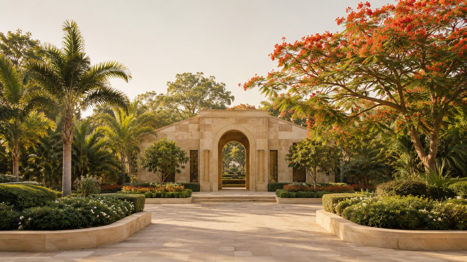 Funeral costs in Queensland: a stone archway and flame tree in a memorial garden